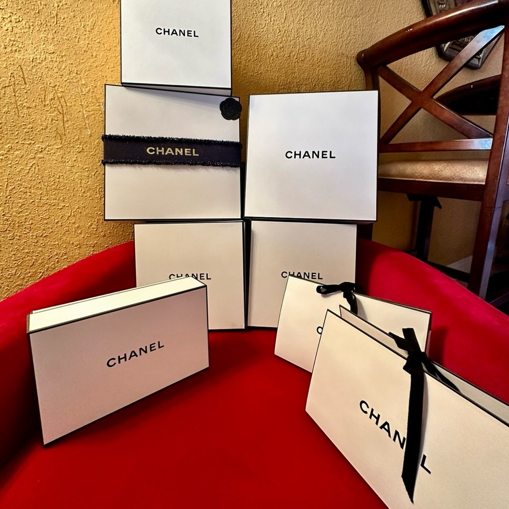 Cartier and Chanel gift bags and boxes